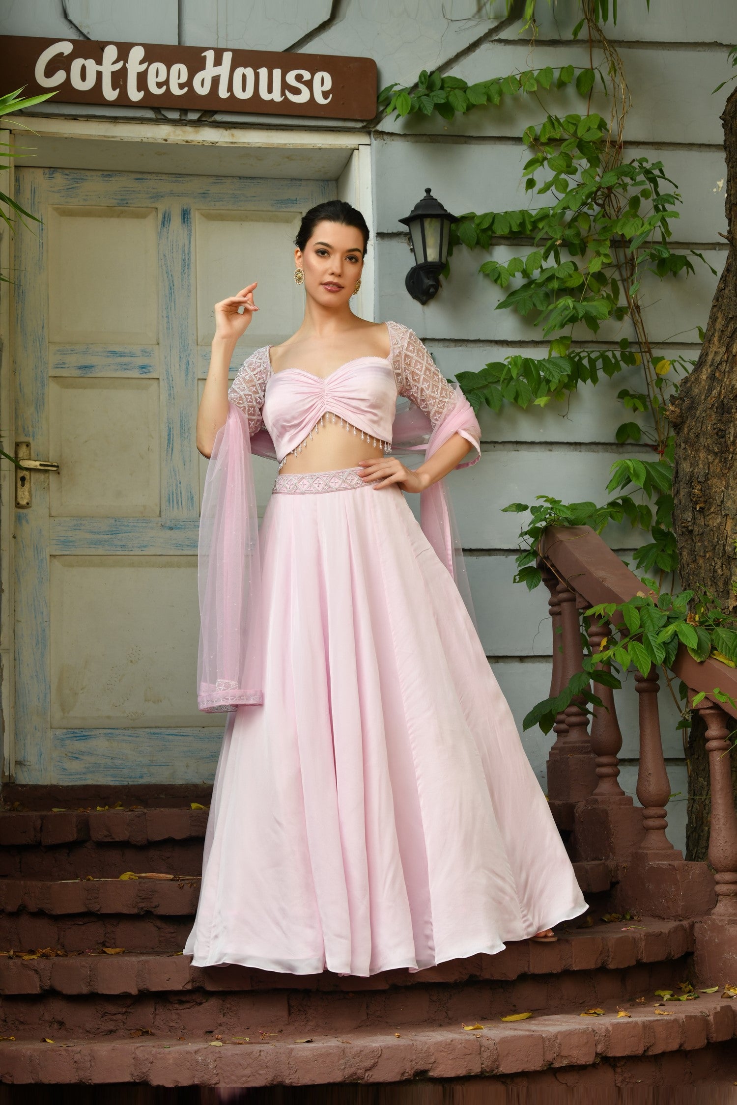 Stylish Indo-Western lehenga set featuring a beautifully flared skirt and a chic crop top, designed for festive celebrations and receptions. - Modern Indo-Western ladies dress – pink designer lehenga with a unique lehenga blouse design for weddings & receptions.