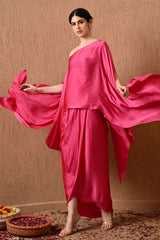 Elegant Pink Kaftan Dress with Draped Skirt by Sunanta Madaan – A luxurious designer kaftan dress featuring a flowy silhouette and handcrafted details. Perfect for wedding guests, cocktail parties, and festive occasions, this Indo-Western kaftan dress blends traditional and modern aesthetics. Shop premium kaftan dresses in India from Sunanta Madaan, Gurgaon, with worldwide shipping. Explore the latest luxury kaftan dresses online for an effortlessly chic look.