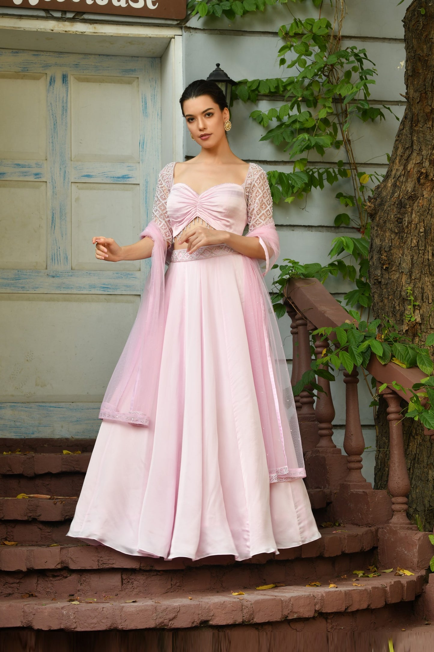 Modern brides' choice – A stunning Indo-Western lehenga for women with a blend of traditional craftsmanship and western-inspired elegance. - Graceful lehenga for bridesmaid – pink lehenga dress with an Indo-Western blouse and elegant lehenga dupatta style for celebrations.
