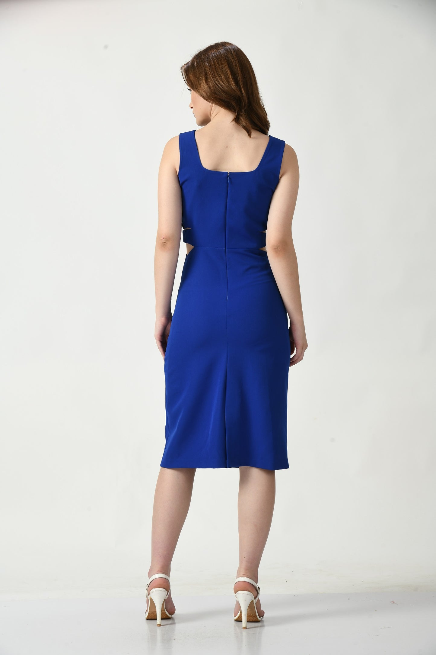 Sapphire Elegance: Glamorous Royal Blue Dress with Stylish Waist Cut