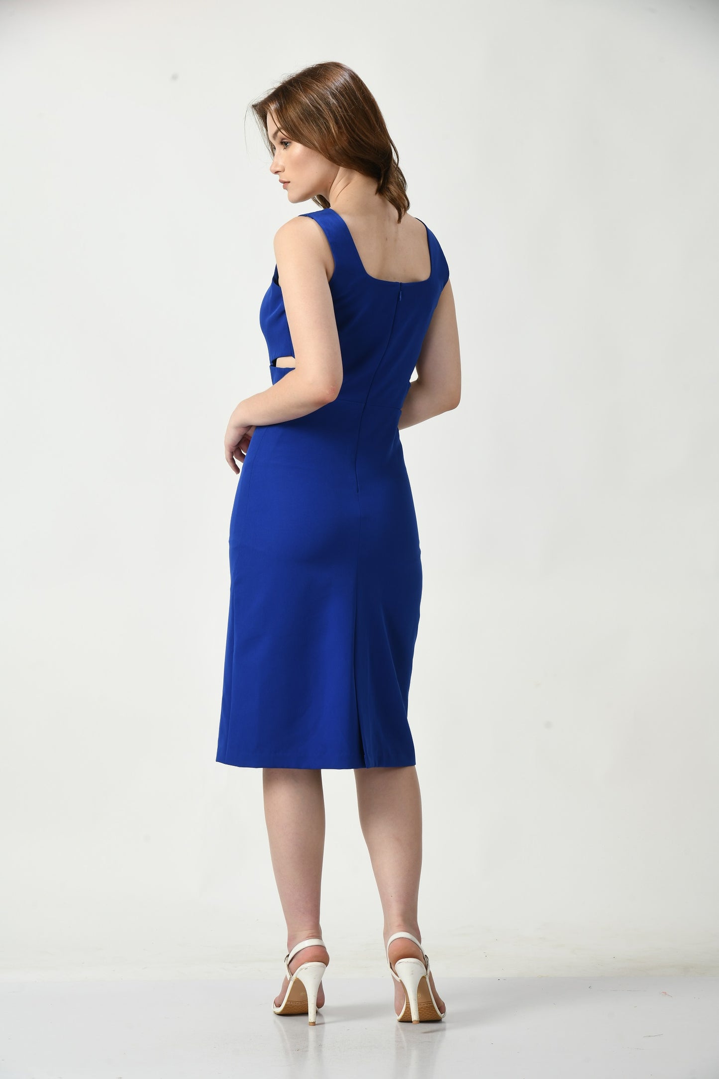 Sapphire Elegance: Glamorous Royal Blue Dress with Stylish Waist Cut