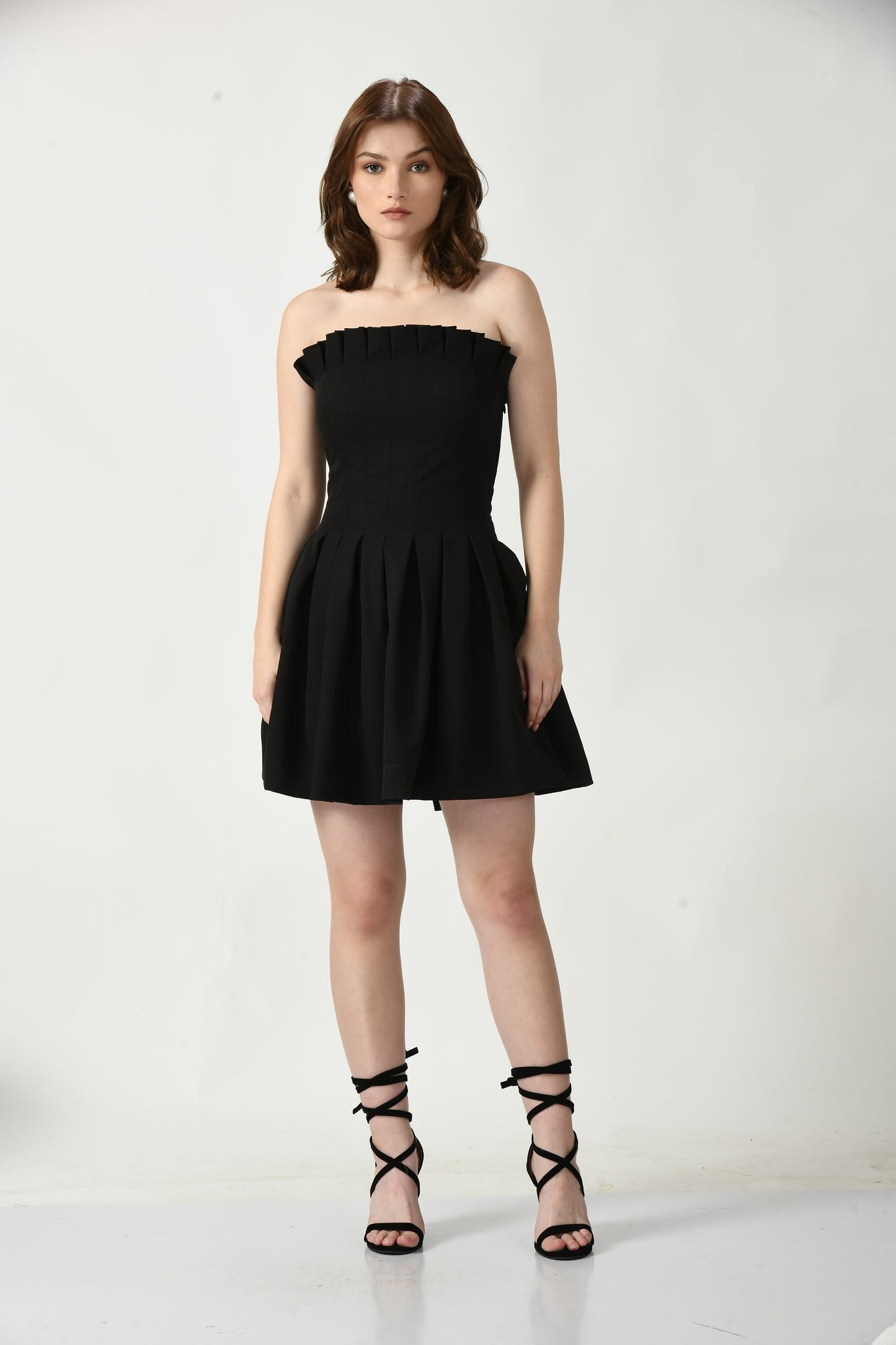 Short Black Dress with Barbie-inspired Chic Detailing