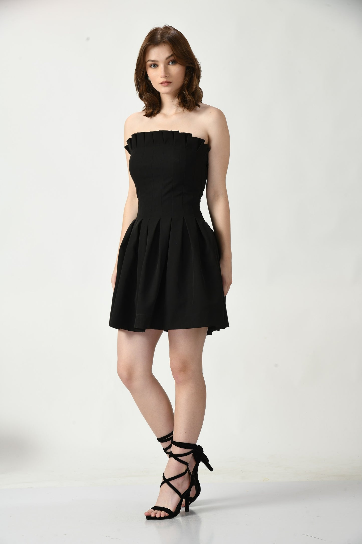 Short Black Dress with Barbie-inspired Chic Detailing